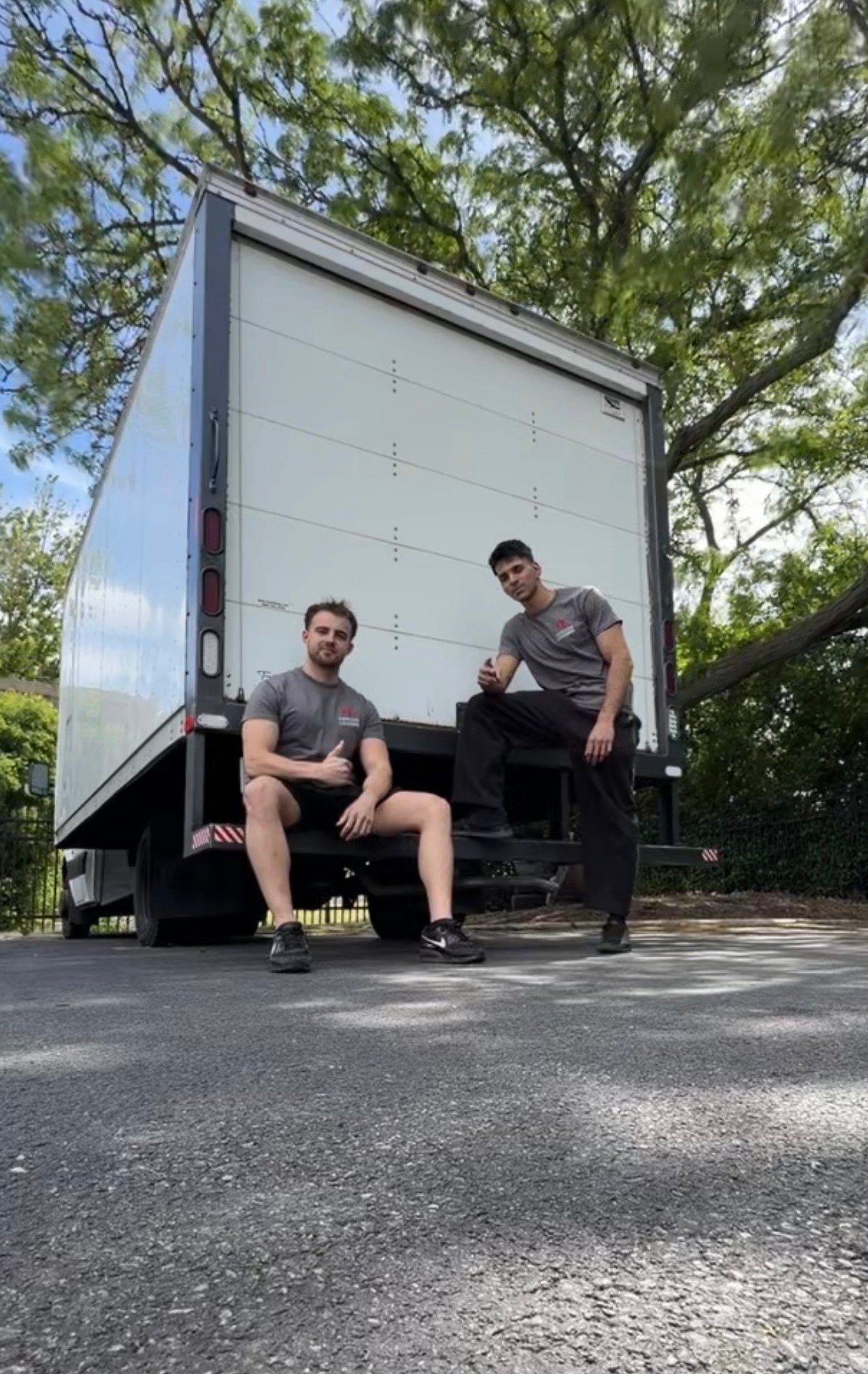 Chicago Loaders crew taking a break at the back of a rental truck