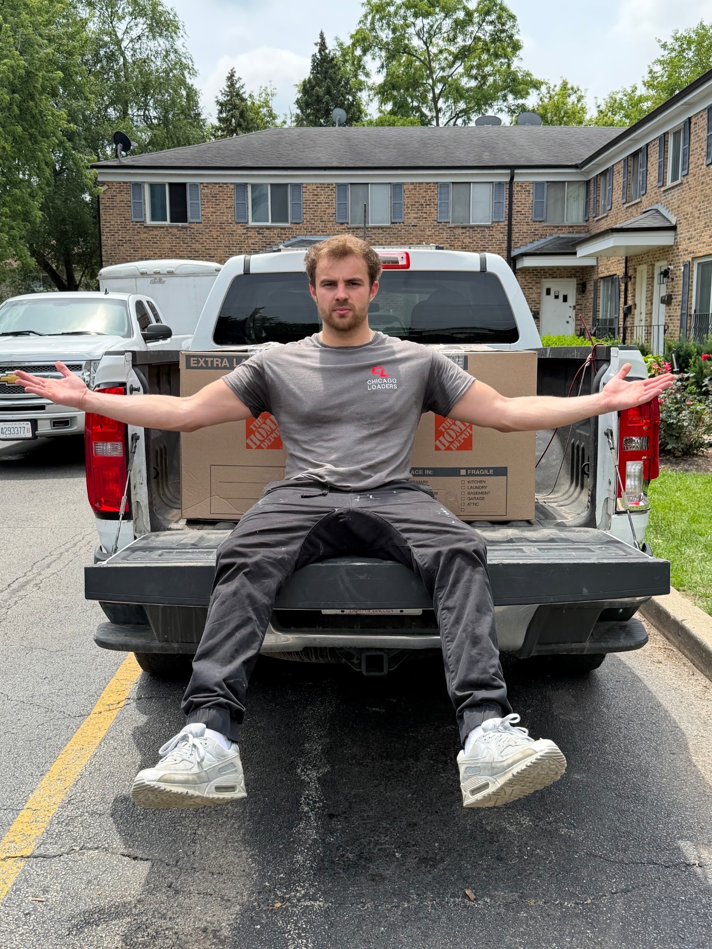 Loader with boxes packed into a pickup truck bed